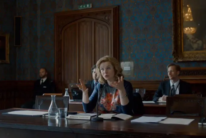 Woman speaking to a room