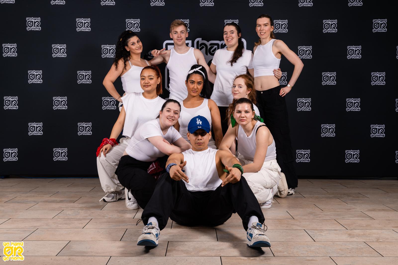 Members of the dance club huddled together