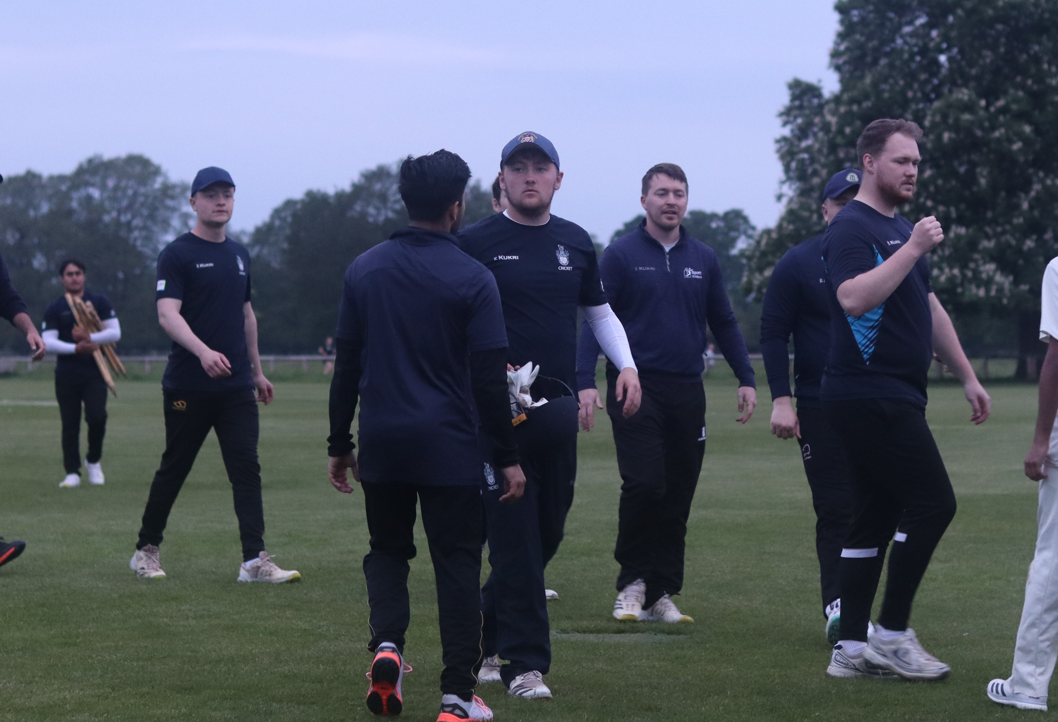 Cricket players talking